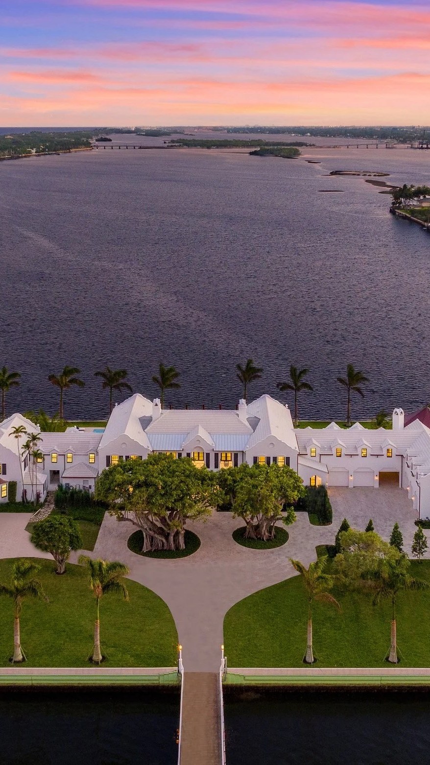 10 Tarpon Island — a private Palm Beach estate at dusk. Representative of the residences Infinite Windows serves.